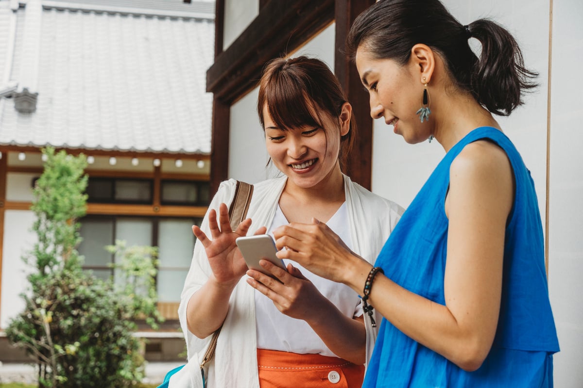 Japanese friends with smartphone together